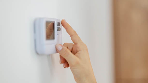 adjusting thermostat