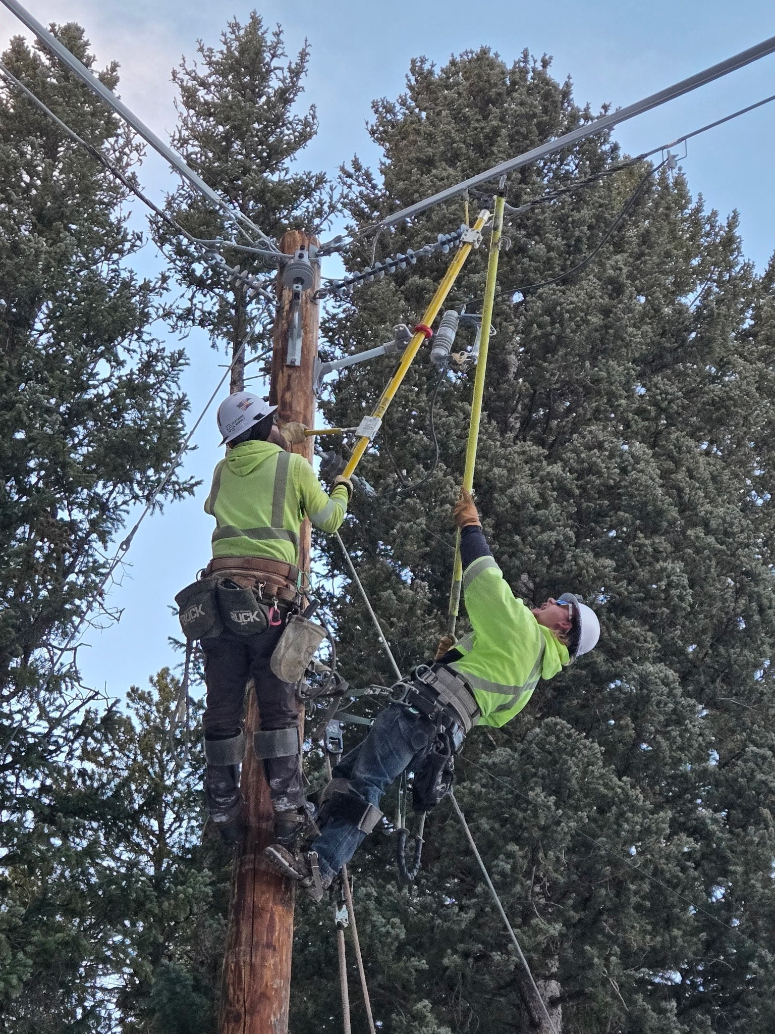 crews working on power pole